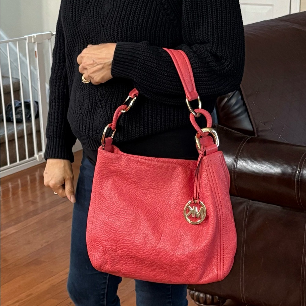 Michael Kors Pebbled Leather Coral hobo .